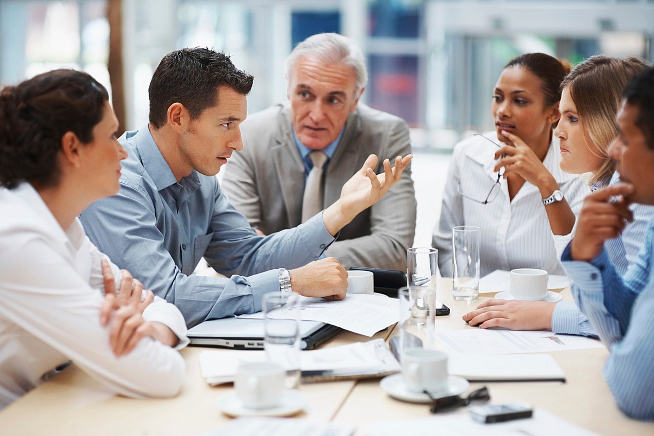 Professional corporate team collaborating in a modern office environment